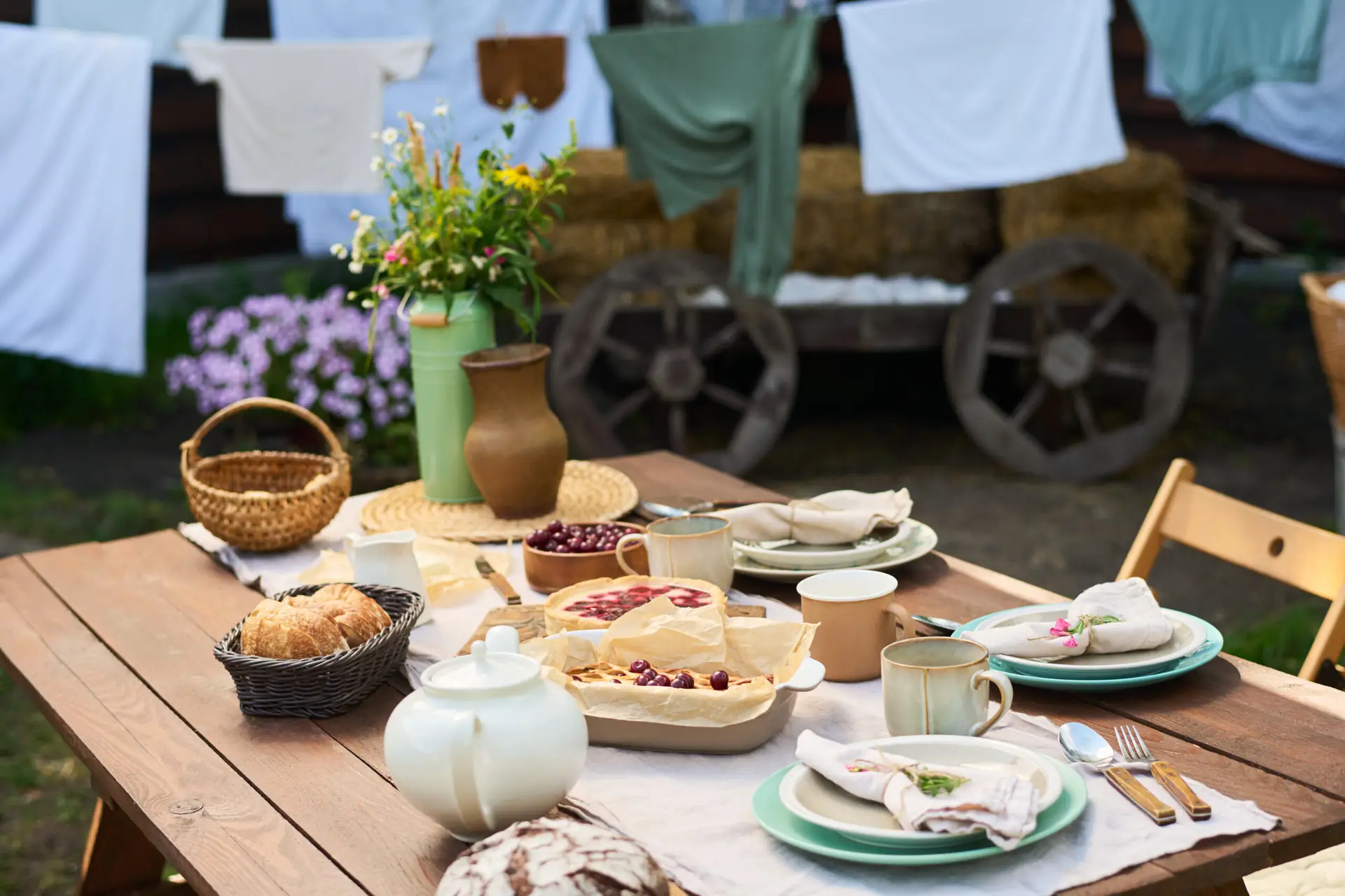 Outdoor Cotswolds table with pastries and homemade food