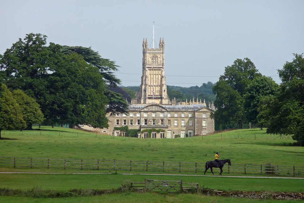 Cirencester Park with the parish church and rider